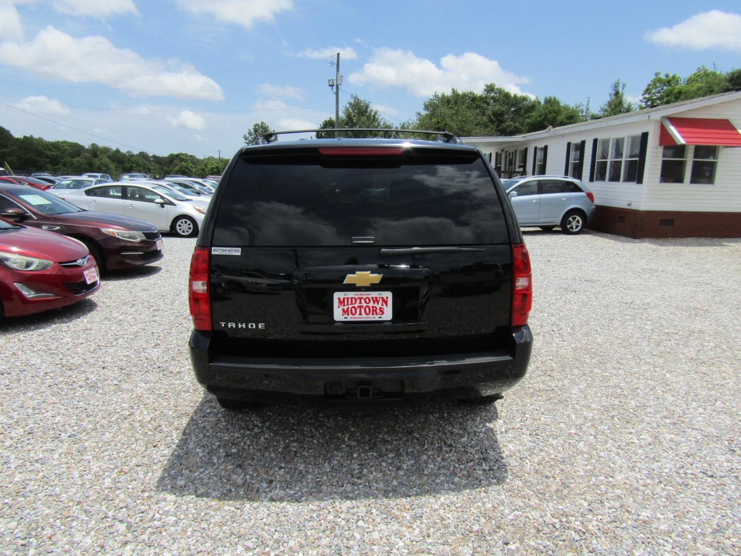 2014 Black /Tan Chevrolet Tahoe (1GNSCBE00ER) with an V8 engine, Automatic transmission, located at 15016 S Hwy 231, Midland City, AL, 36350, (334) 983-3001, 31.306210, -85.495277 - Photo#6